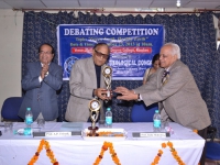 Prof. O.P. Varma presenting IGC memnto to Prof. A.P. Trivedi. On the extreme left is Prof. Rajesh Chandra, Professor of Architecture and planning, IIT Roorkee, who constituted the panel of three judges.