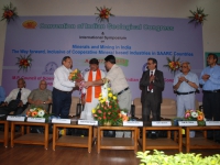 Inauguration : President Shri S.K. Srivastava, being welcomed by Prof. Pramod K. Verma. Standing in the middle is the Chief Guest.