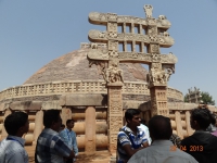The great Sanchi Stupa a UNESCO heritage with one of the four gates around it.