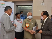 At the registration counter: Greetings to Prof. O.P. Varma, Guest-of- Honour, MEFCI-22, by Dr. Harsh K. Gupta (on right), President Geological Society of India and Dr. D.K. Sinha, Director, AMD along with Shri R. Mamallan, Additional Director, AMD