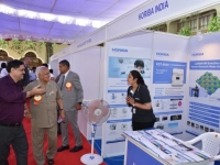 Visit to Expo by Prof. O.P. Varma along with other dignitaries, mutually interactive with the lady at the stall.